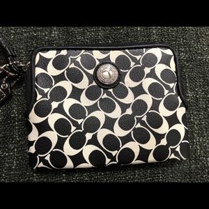 Black and White Coach Wristlet.